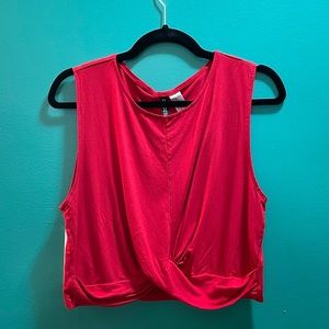 Red draped sleeveless crop top
